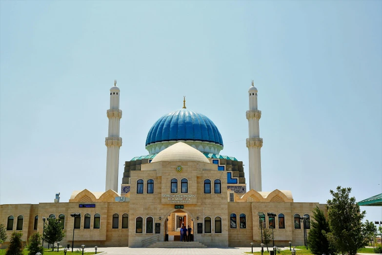 a large building with a blue dome on top of it, by Abdullah Gërguri, pexels contest winner, hurufiyya, parks and monuments, 2 5 6 x 2 5 6, puṣkaracūḍa, front