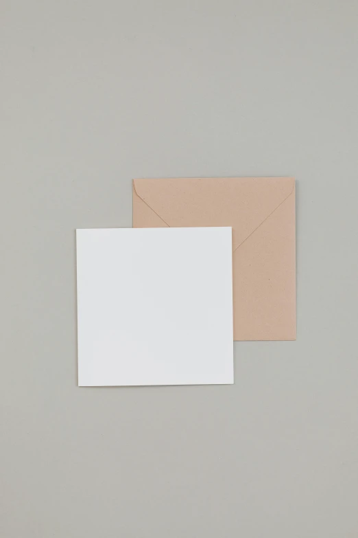 two blank cards sitting on top of each other, an album cover, square, neutral, 3 - piece, no people