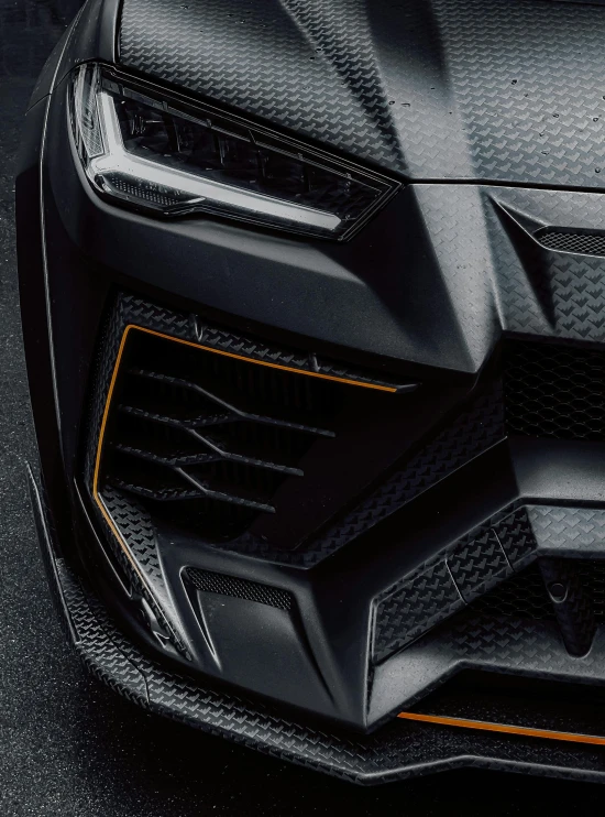 the front end of a black sports car, an album cover, carbon fibers, 8k insane detail, square, ultra wide