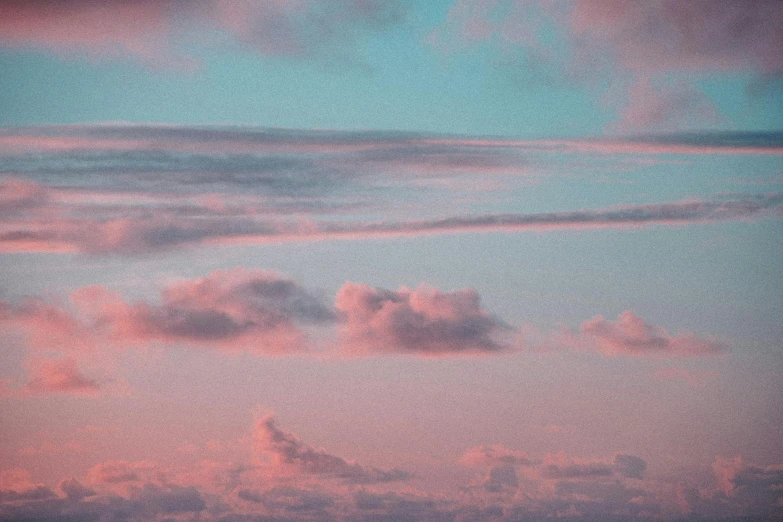 a large body of water under a cloudy sky, an album cover, inspired by Elsa Bleda, trending on pexels, aestheticism, pink clouds, red sky blue, instagram picture, major arcana sky