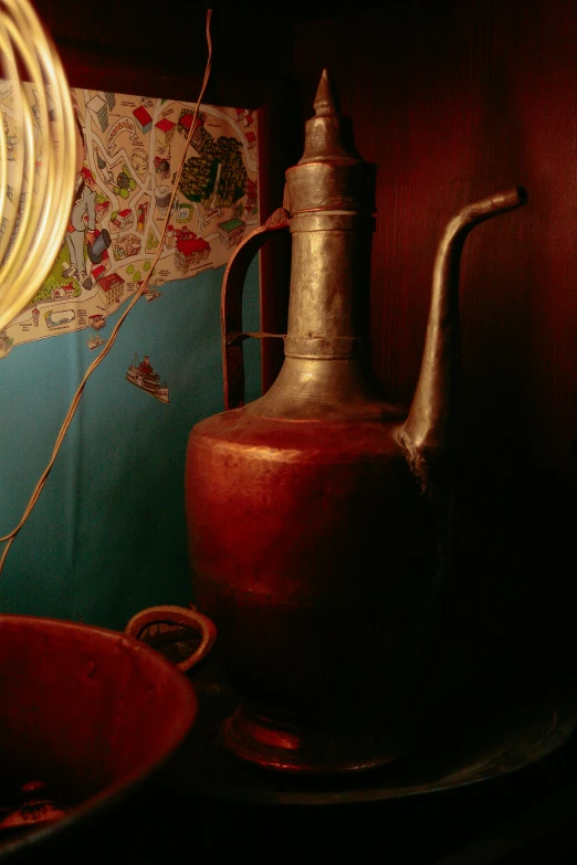 a vase sitting on top of a table next to a mirror, a still life, flickr, cloisonnism, in a medieval tavern at night, ( ( photograph ) ), watering can, red room