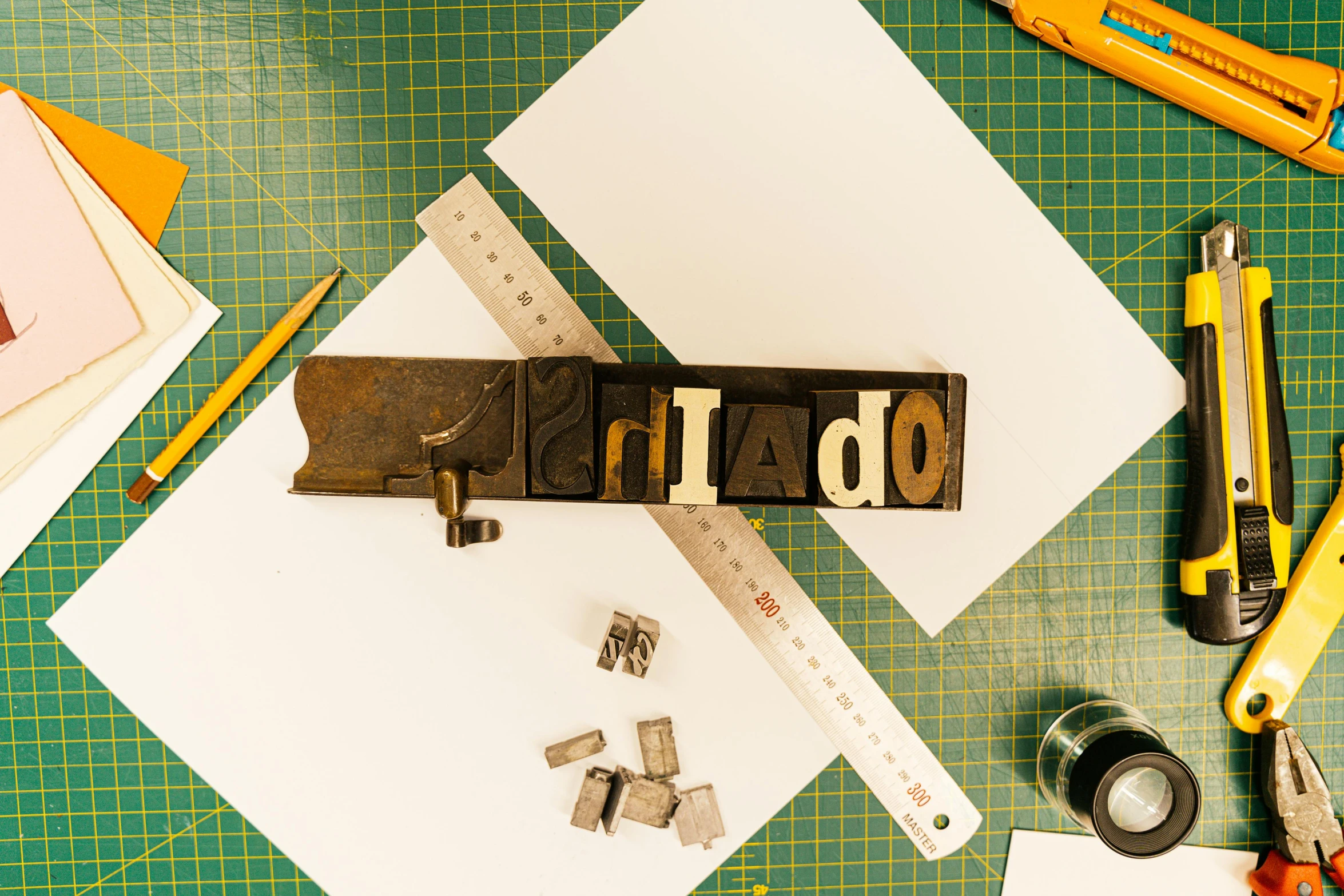 a variety of office supplies laid out on a table, inspired by Rinaldo Cuneo, international typographic style, crafting, thumbnail, metalwork, canva