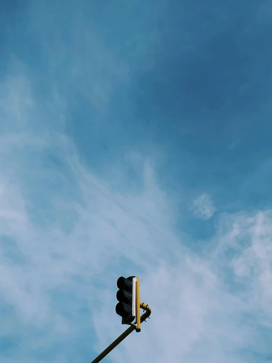 a traffic light sitting on top of a pole, by Carey Morris, unsplash, postminimalism, high clouds, instagram story, profile image