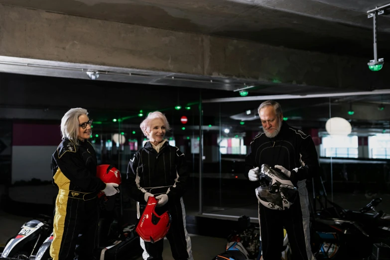 a group of people standing next to motorcycles, in an underground parking garage, skintight suits, dementia, roller skating