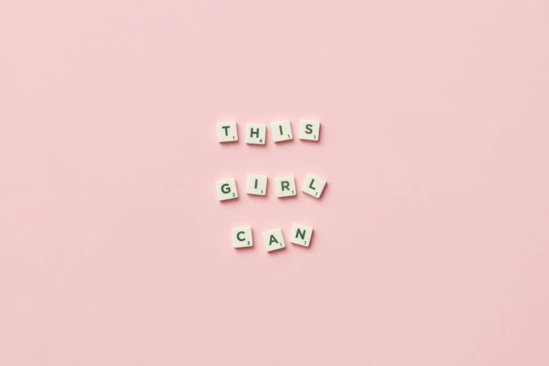 scrabbles spelling this girl can on a pink background, inspired by Tracey Emin, trending on unsplash, feminist art, background image, | 35mm|, workout, pregnancy