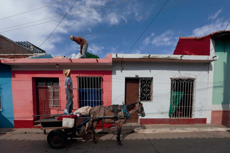 a horse pulling a cart down a street, by Nathalie Rattner, red roofs, slide show, juan jose serrano, thumbnail