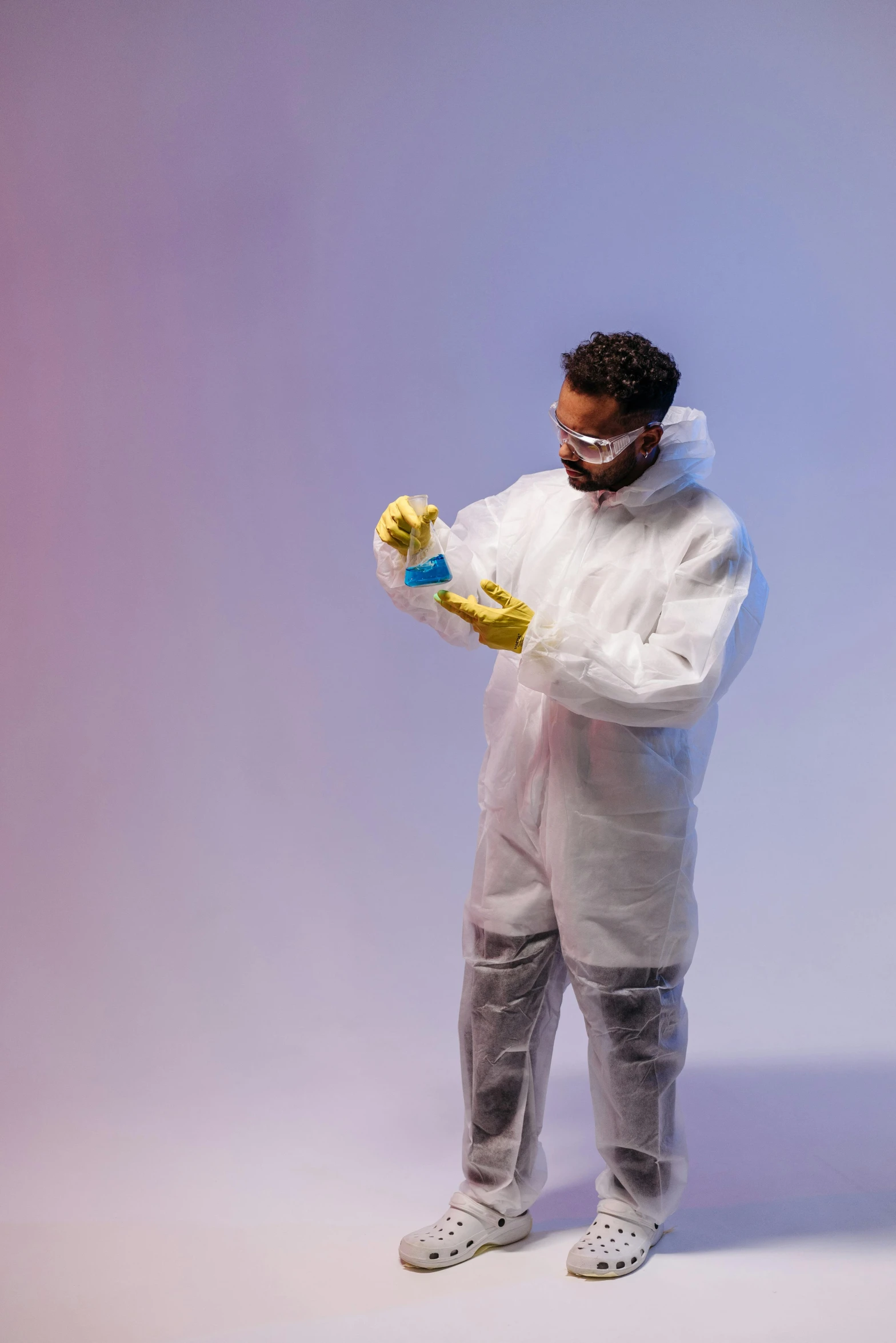 a man wearing a protective suit and gloves, an album cover, pexels, lab coat, full body shoot, polychromatic, teddy fresh