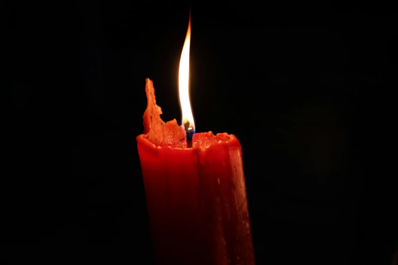 a red candle is lit in the dark, inspired by Hubert Robert, pexels, highly detailed melted wax, rendered in povray, instagram post, deteriorated