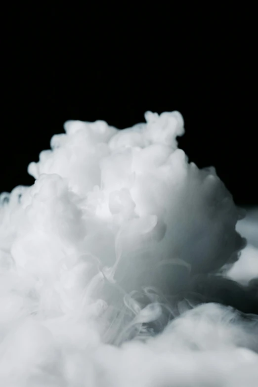 a cloud of white smoke on a black background, inspired by Kim Keever, unsplash, process art, closeup portrait, made of cotton candy, foamy waves, ready to eat