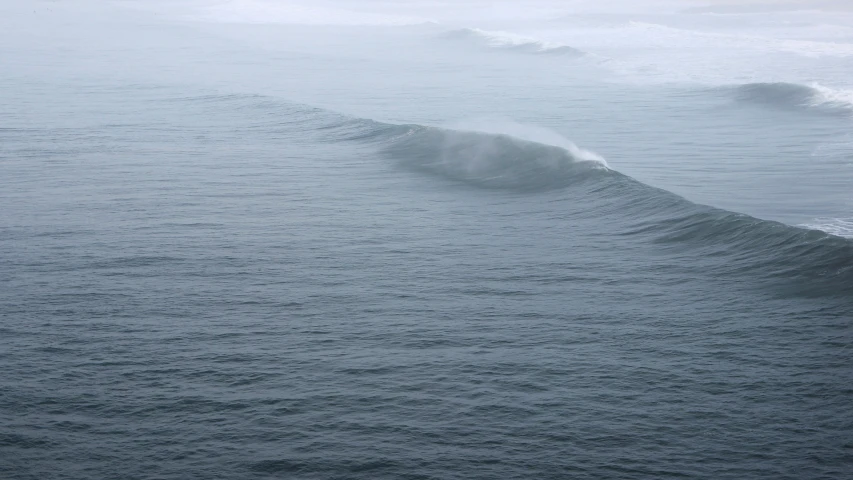 a man riding a surfboard on top of a wave in the ocean, by Neil Boyle, hurufiyya, observed from afar in the fog, detailed photo 8 k, ignant, haida gwaii