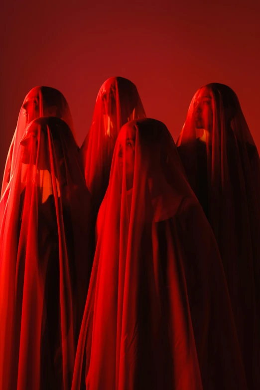 three women in red veils standing next to each other, an album cover, inspired by Vanessa Beecroft, the nine circles of hell, aerochrome eyes, funeral veil, concert