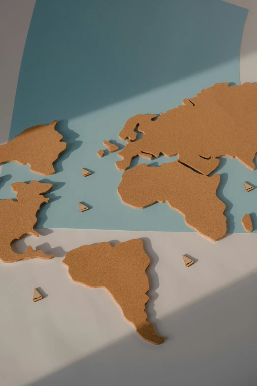 a map of the world cut out of cardboard, trending on unsplash, regionalism, illustration”, multiple stories, tabletop, hard surface model