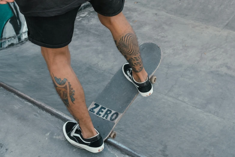 a man riding a skateboard up the side of a ramp, a tattoo, pexels contest winner, zero g, gray shorts and black socks, detailed skin, half image