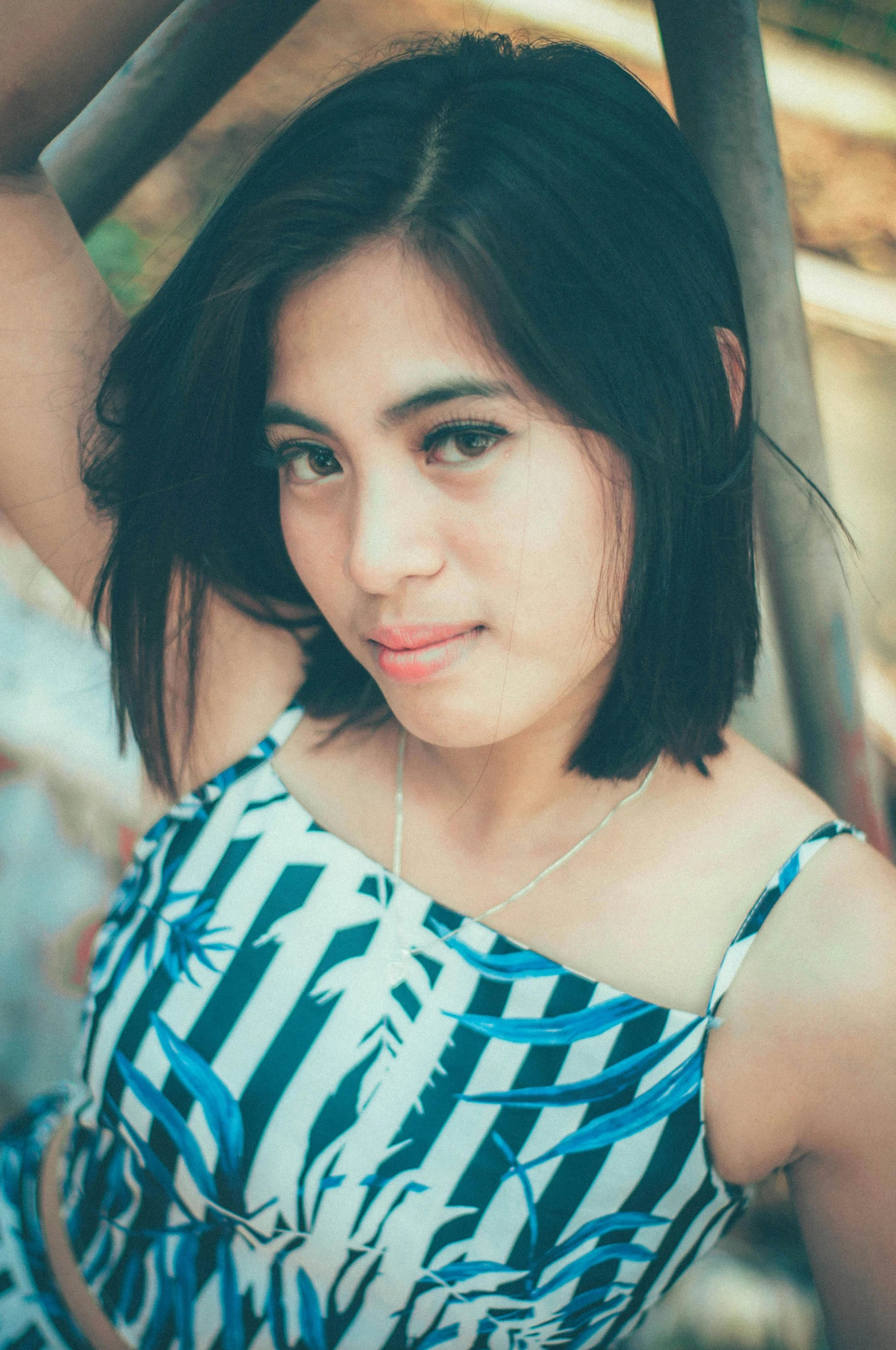 a woman in a blue and white dress posing for a picture, a picture, unsplash, tachisme, with a bob cut, south east asian with long, cute young woman, square