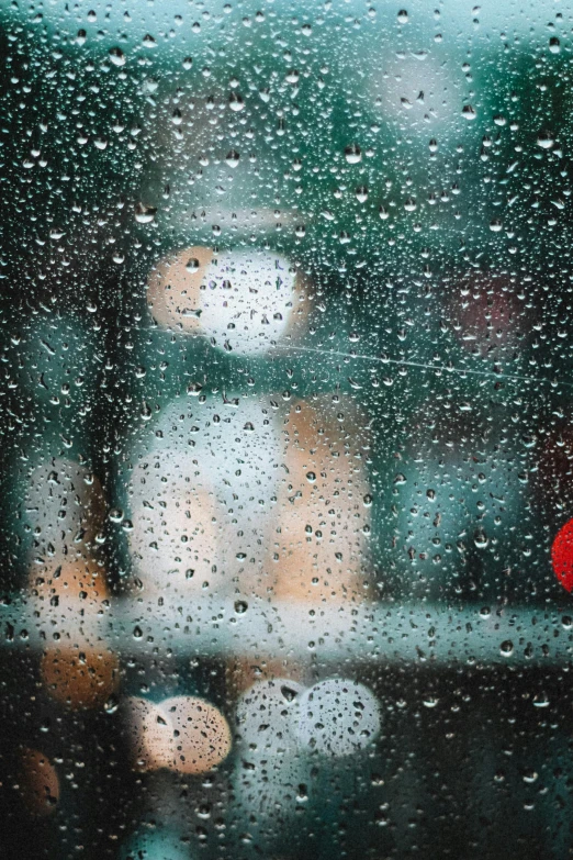 a red stop sign sitting next to a window covered in rain, a picture, inspired by Elsa Bleda, trending on unsplash, wet reflections in square eyes, high quality photo, made out of rain, contemplating