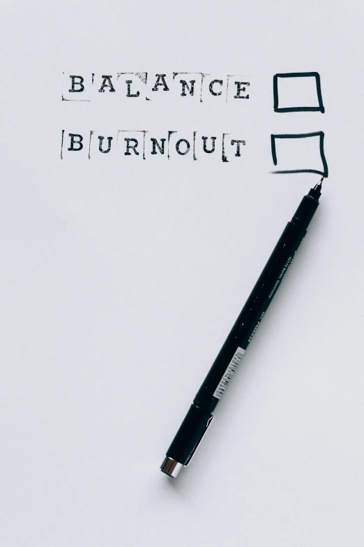 a pen sitting on top of a piece of paper, burnout, science journal cover, cutout, balance