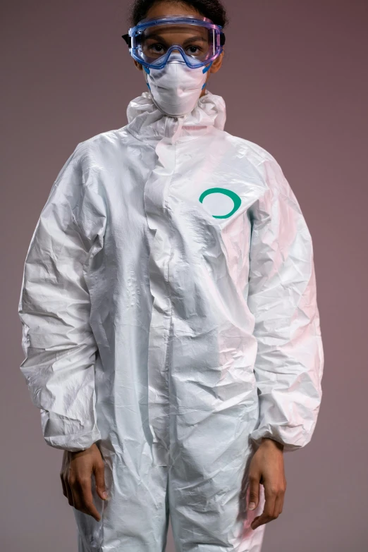 a woman wearing a protective suit and goggles, inspired by Ei-Q, plasticien, enso, white and teal garment, julian ope, over-detailed