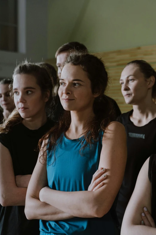 a group of women standing next to each other, by Adam Marczyński, dancer, looking from shoulder, yulia nevskaya, promo image