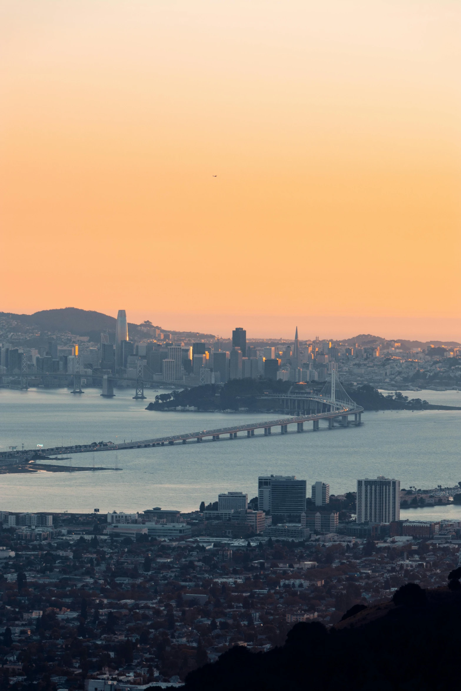 a view of a city from the top of a hill, by Dan Scott, pexels contest winner, renaissance, bay area, sunset panorama, soft morning light, 8 k hi - res