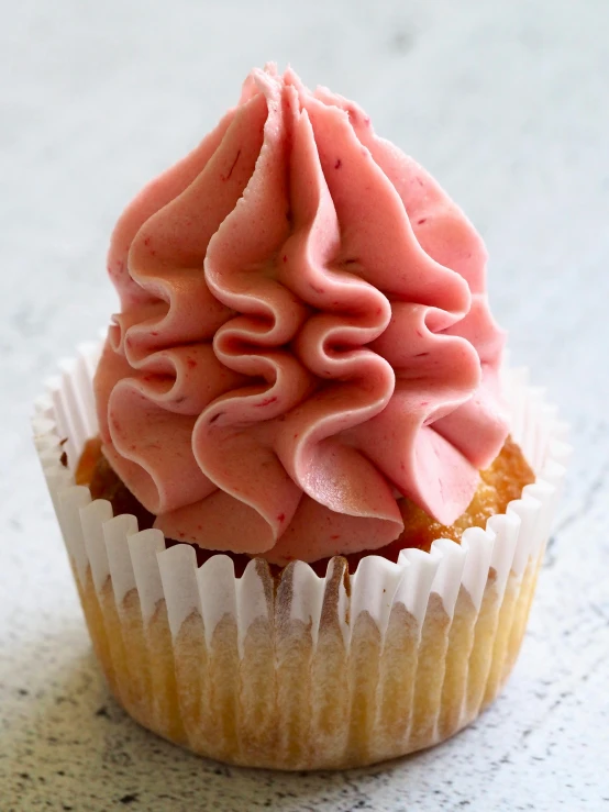 a close up of a cupcake with pink frosting, by Eleanor Best, organic rippling spirals, pale red, pointè pose, thumbnail