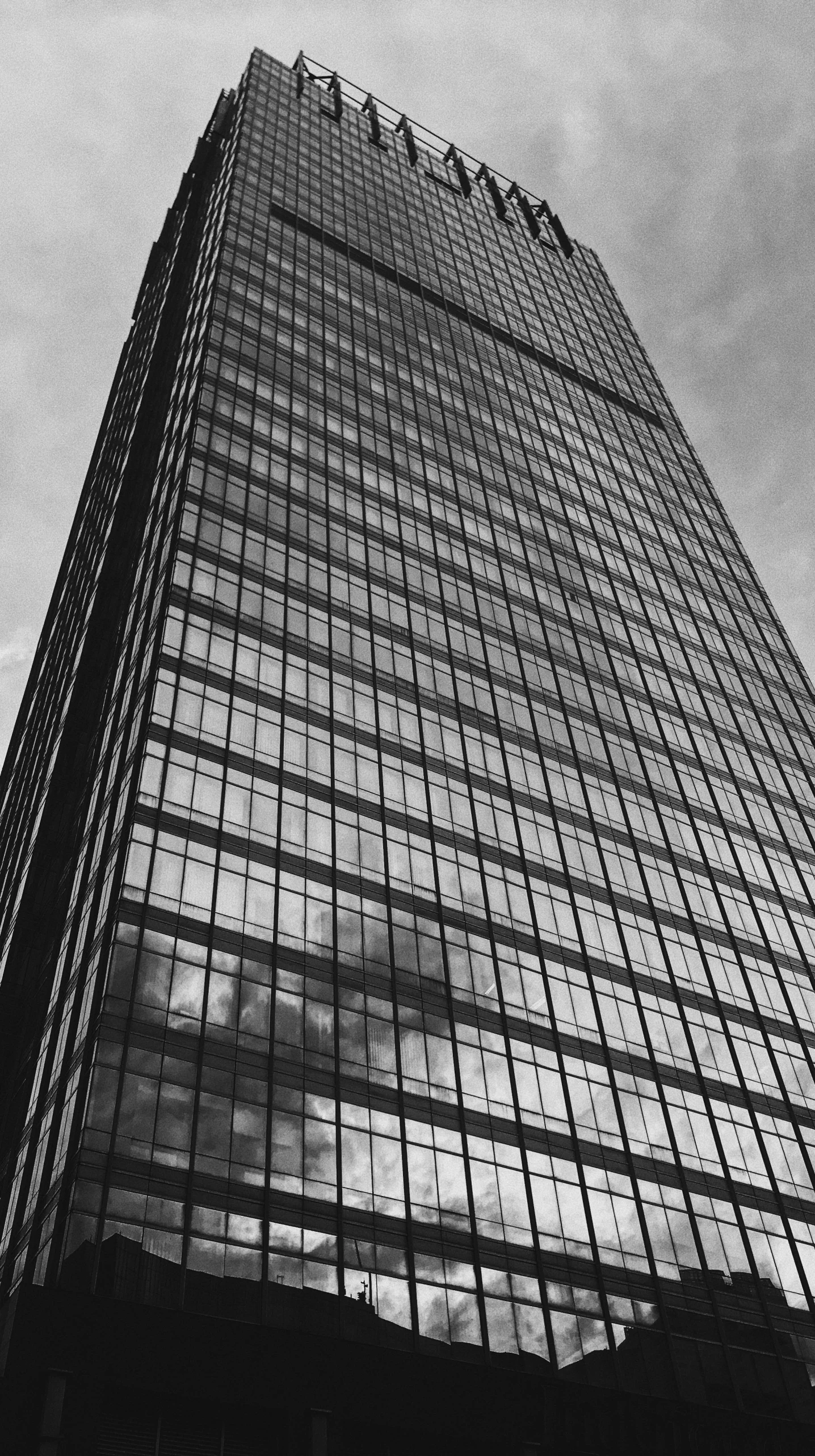 a black and white photo of a tall building, inspired by Richard Wilson, square, hq ”, photo”