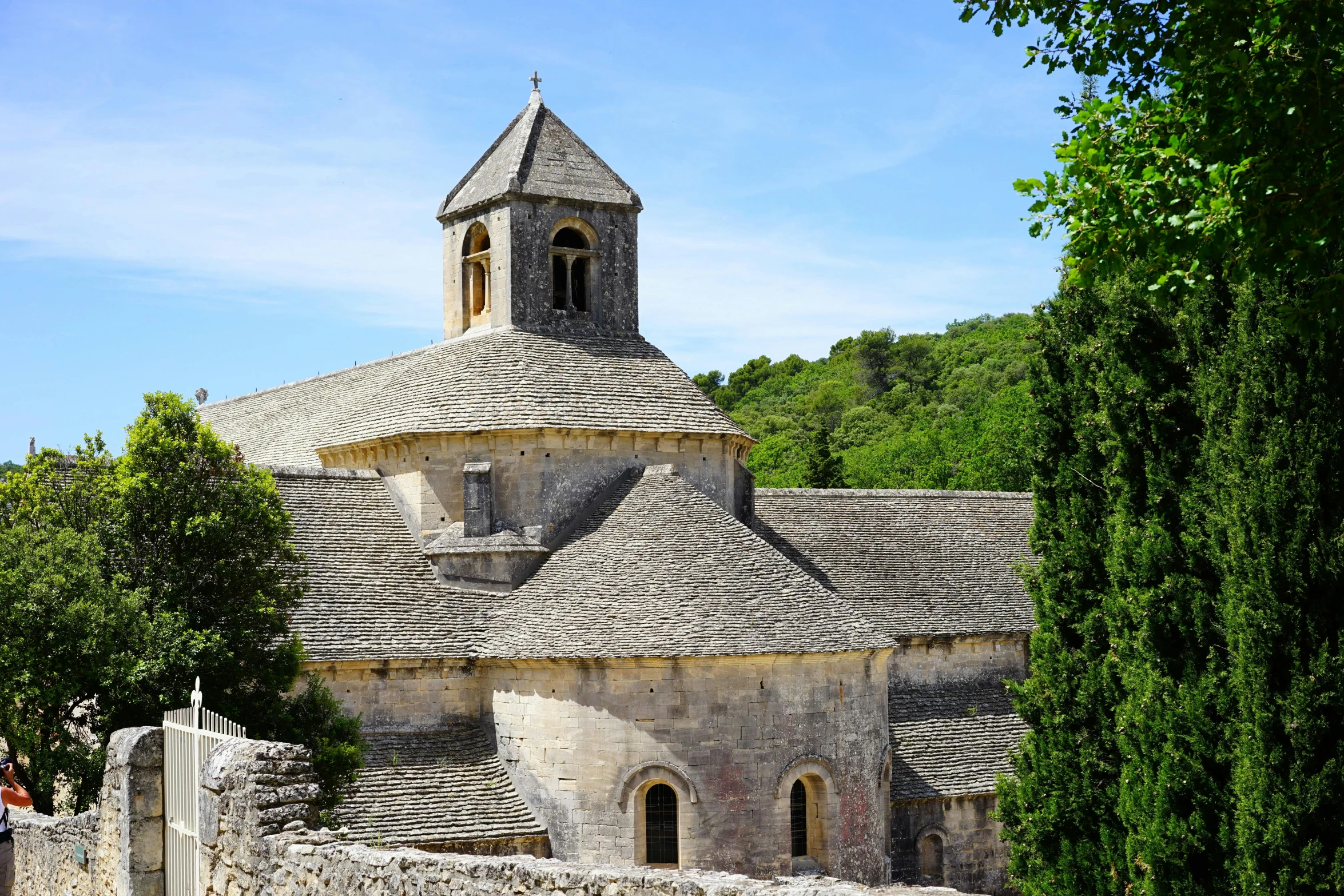 a large stone building with a clock tower, pexels contest winner, romanesque, in a monestry natural lighting, square, panoramic, st cirq lapopie