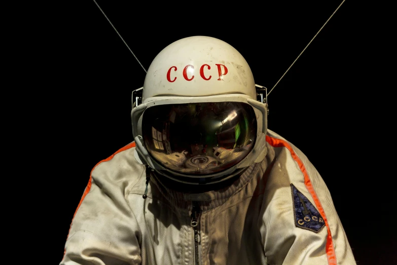 a close up of a person in a space suit, inspired by Aleksandr Gerasimov, unsplash, hyperrealism, on display in a museum, 1962 soviet, 8k resolution”