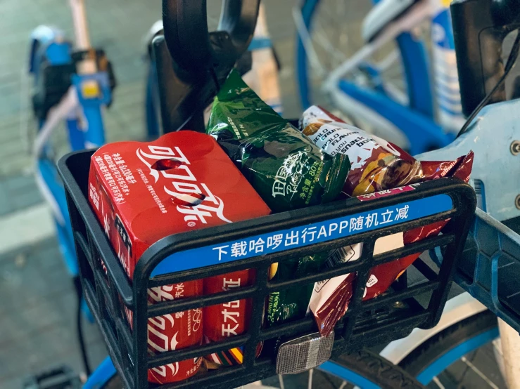 a bicycle with a basket full of snacks, by Jang Seung-eop, happening, pepsi, medium close-up shot, avatar image, tripmachines