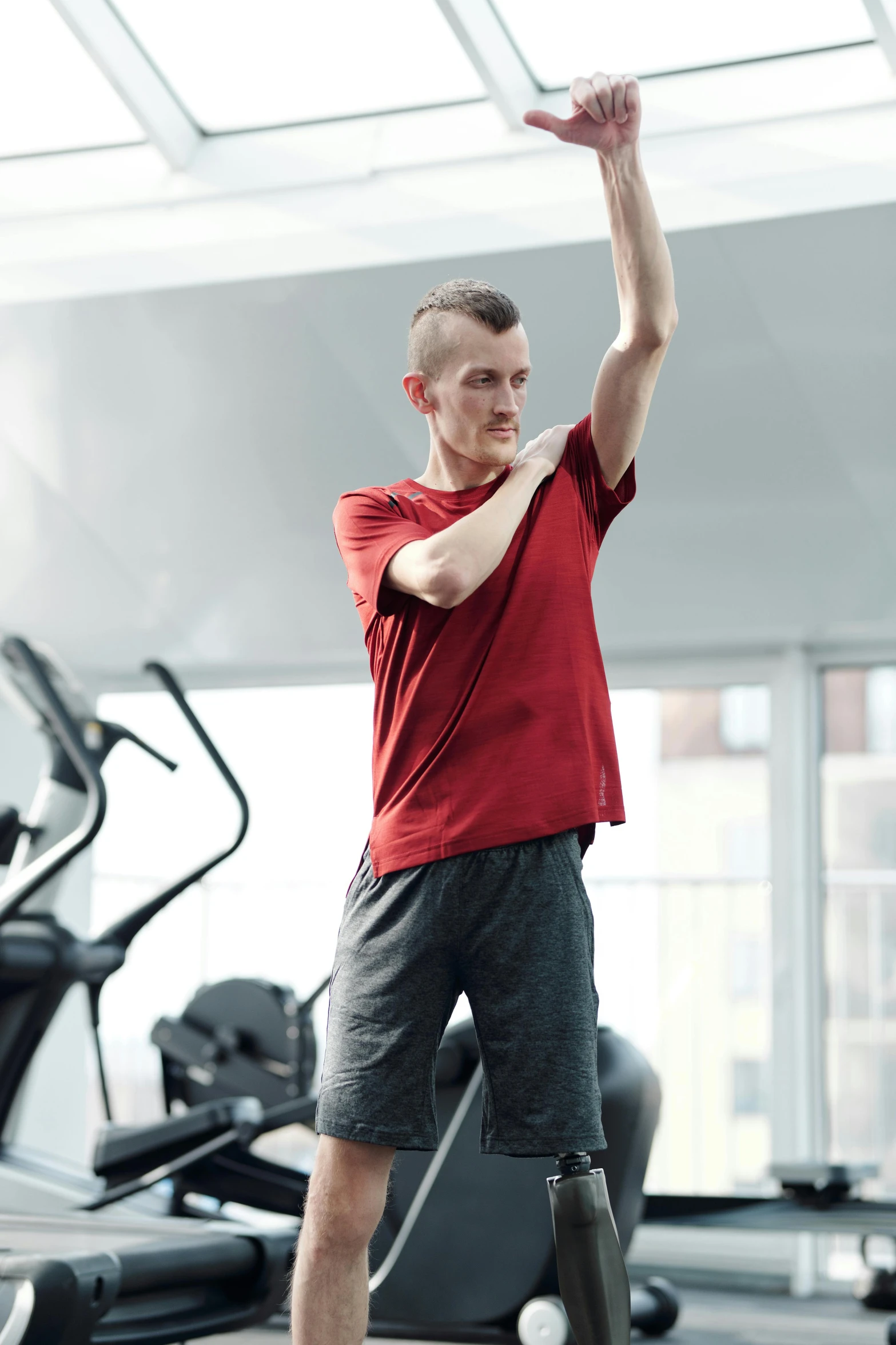 a man throwing a frisbee in a gym, inspired by Jakob Gauermann, happening, man in adidas tracksuit, centered shoulders up view, promo image, vitalik buterin