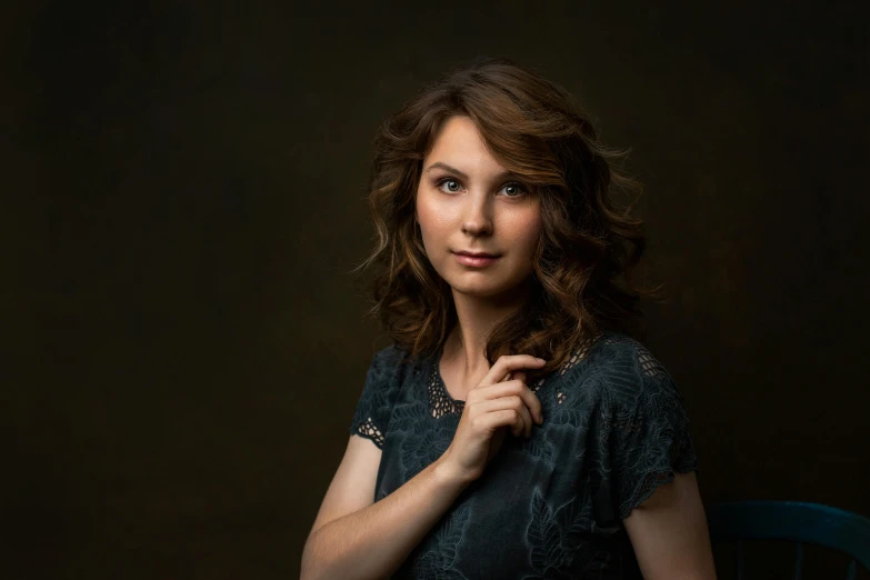 a woman in a black dress posing for a picture, a portrait, by Winona Nelson, pexels contest winner, girl with brown hair, promotional image, cory loftis, an intricate