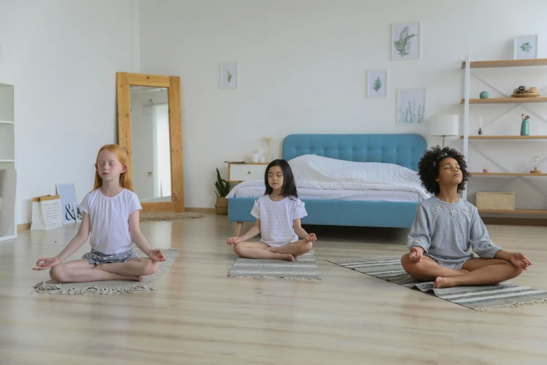 a group of women sitting on top of a wooden floor, meditation pose, sitting on a bed, avatar image, for kids