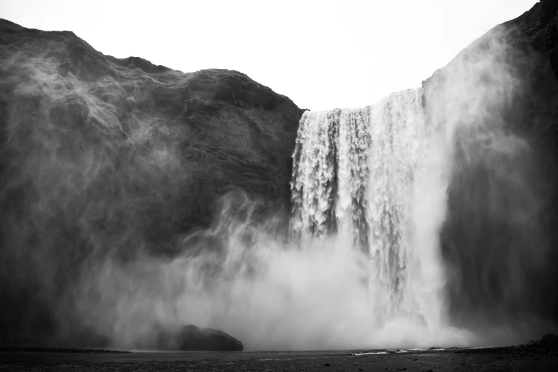 a black and white photo of a waterfall, a black and white photo, pexels contest winner, romanticism, dust motes in air, reykjavik, hd footage, farming