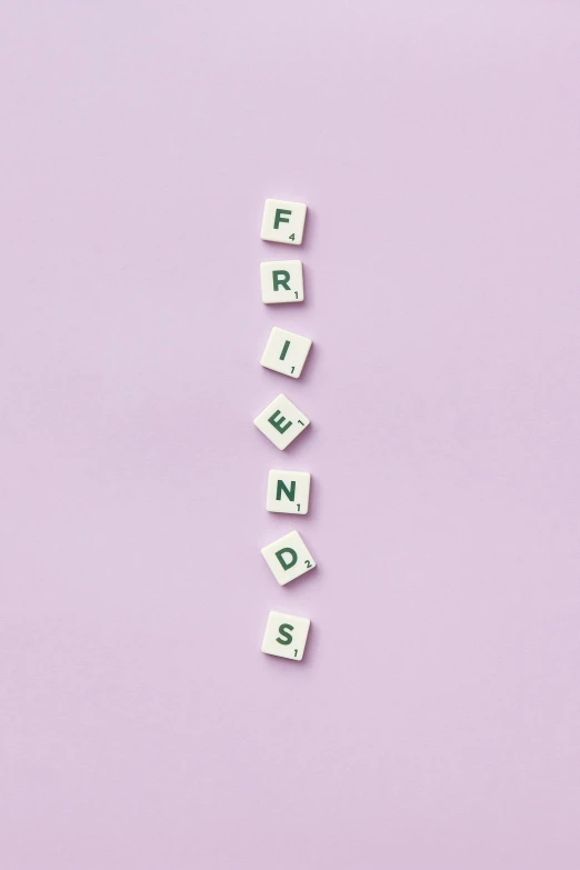 the word friends spelled with scrabbles on a pink background, a picture, by Alison Geissler, trending on pexels, visual art, white and purple, morandi, ffffound, adorable