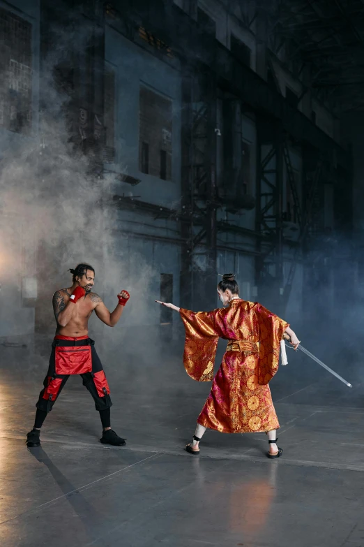 a couple of men standing next to each other on a stage, inspired by Ma Quan, pexels contest winner, gutai group, getting ready to fight, fire fight, the last airbender, [ theatrical ]