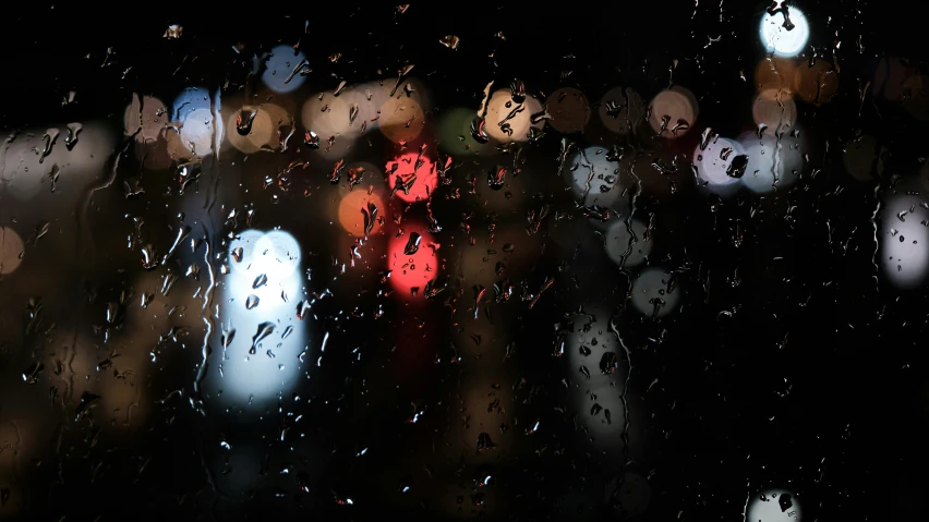 a close up of a window with rain on it, an album cover, inspired by Elsa Bleda, pexels contest winner, car lights, today\'s featured photograph 4k, streetlights, ilustration