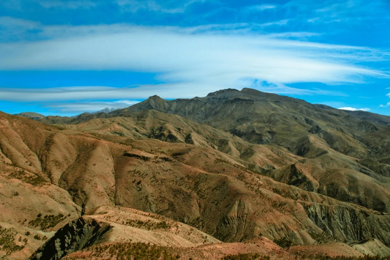 a view of the mountains from the top of a hill, pexels contest winner, les nabis, in chuquicamata, earth colors, slide show, 2 0 0 0's photo