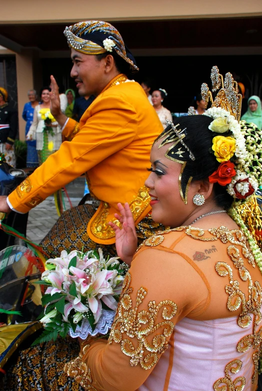 a man riding on the back of a horse next to a woman, flickr, happening, ceremony, ornate attire, jakarta, bouquet