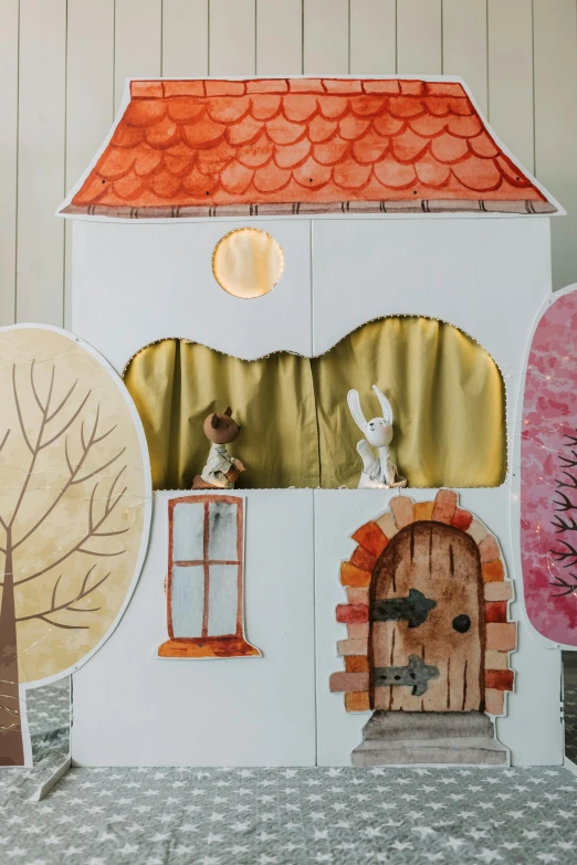 a paper doll house sitting on top of a table, a cartoon, inspired by Elsa Beskow, pexels contest winner, folk art, treehouse, bunny, theater stage, canvas
