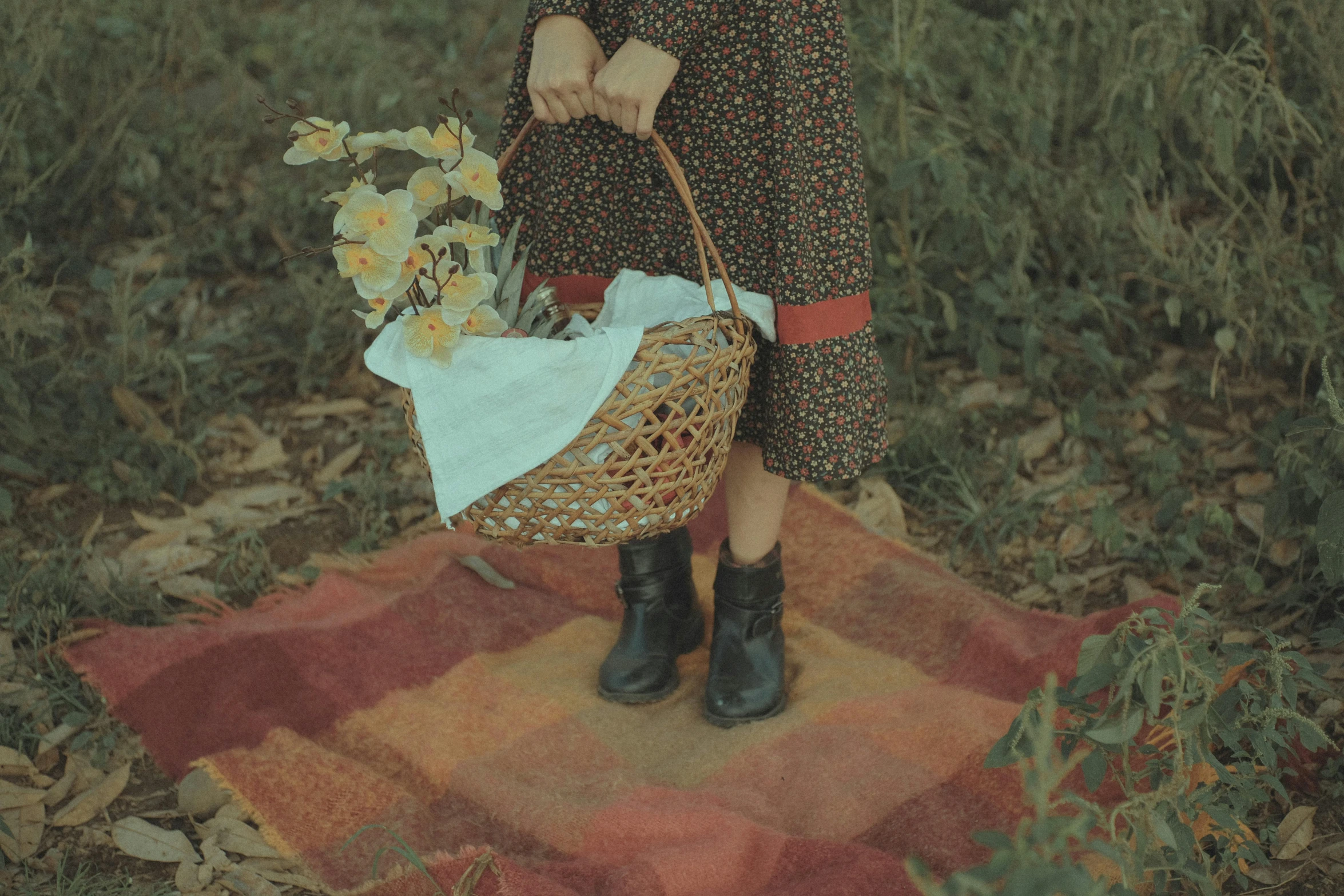 a little girl holding a basket of flowers, an album cover, inspired by Oleg Oprisco, pexels contest winner, post-impressionism, wears brown boots, picnic, still from a music video, 1 9 2 0 cloth style