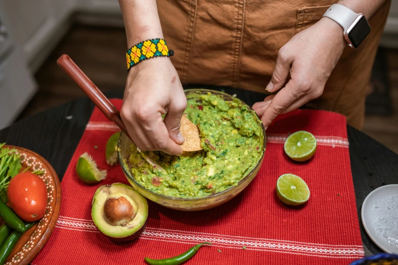 a person dipping a tortilla into a bowl of guacamole, by Dan Content, pexels, cottagecore hippie, avatar image, cutout, julia fuentes