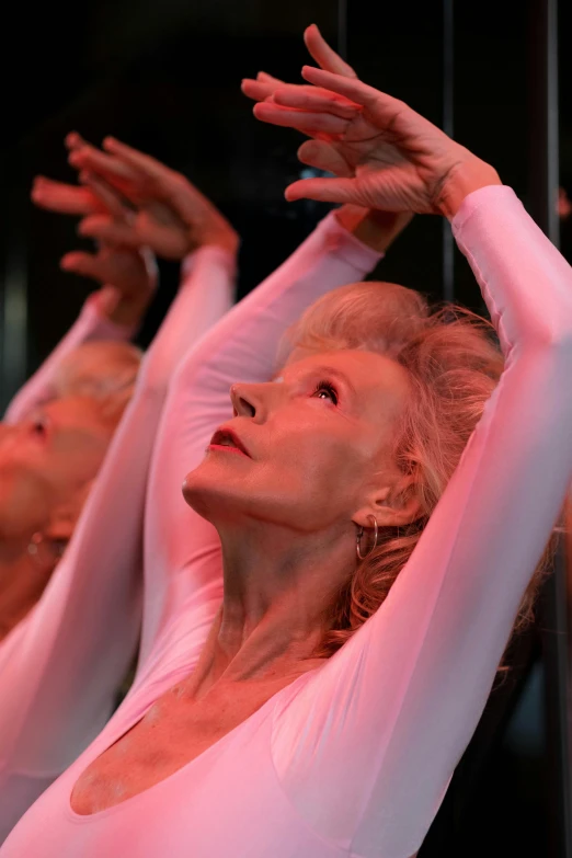 a group of women standing next to each other, arabesque, wrinkles and muscles, white hair floating in air, full of mirrors, filmstill