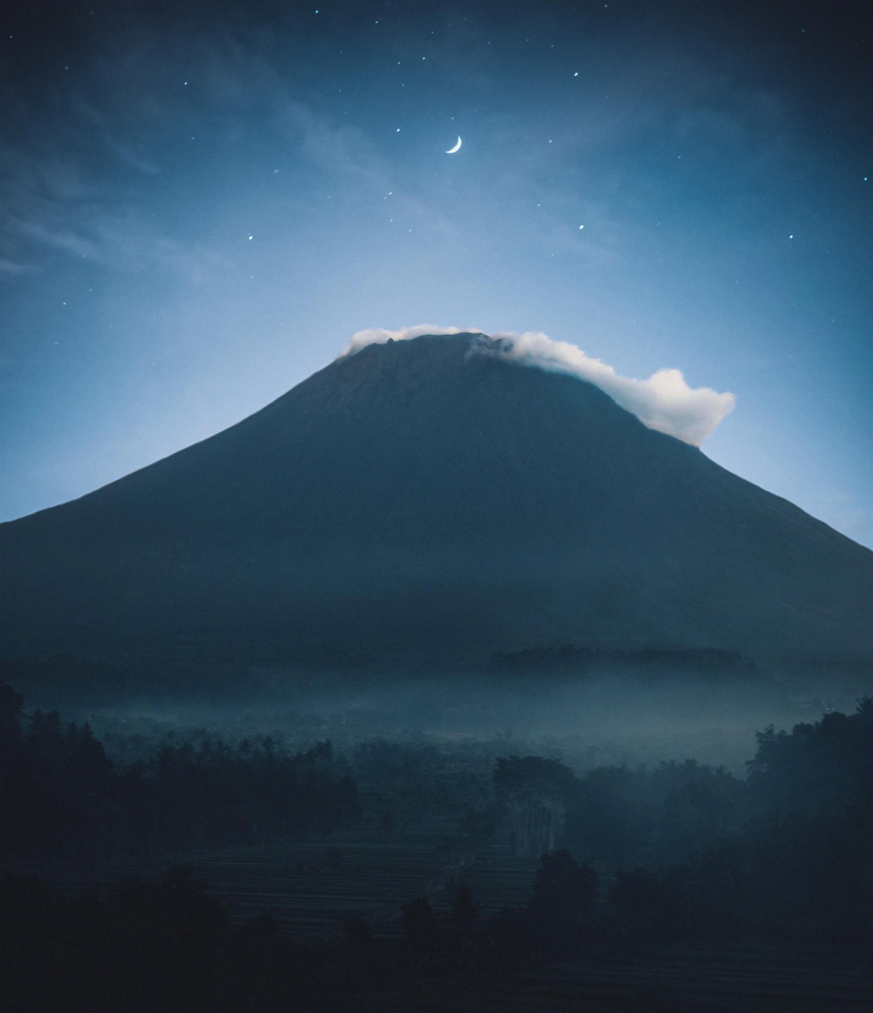 a mountain with a cloud on top of it, by Sebastian Spreng, unsplash contest winner, sumatraism, moonlight grey, volcano, today\'s featured photograph 4k, midnight blue