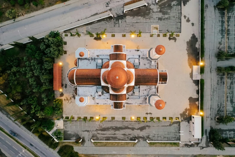 an aerial view of an orange and white building, unsplash contest winner, renaissance, mosque, jamaica, taken with sony alpha 9, orthodox