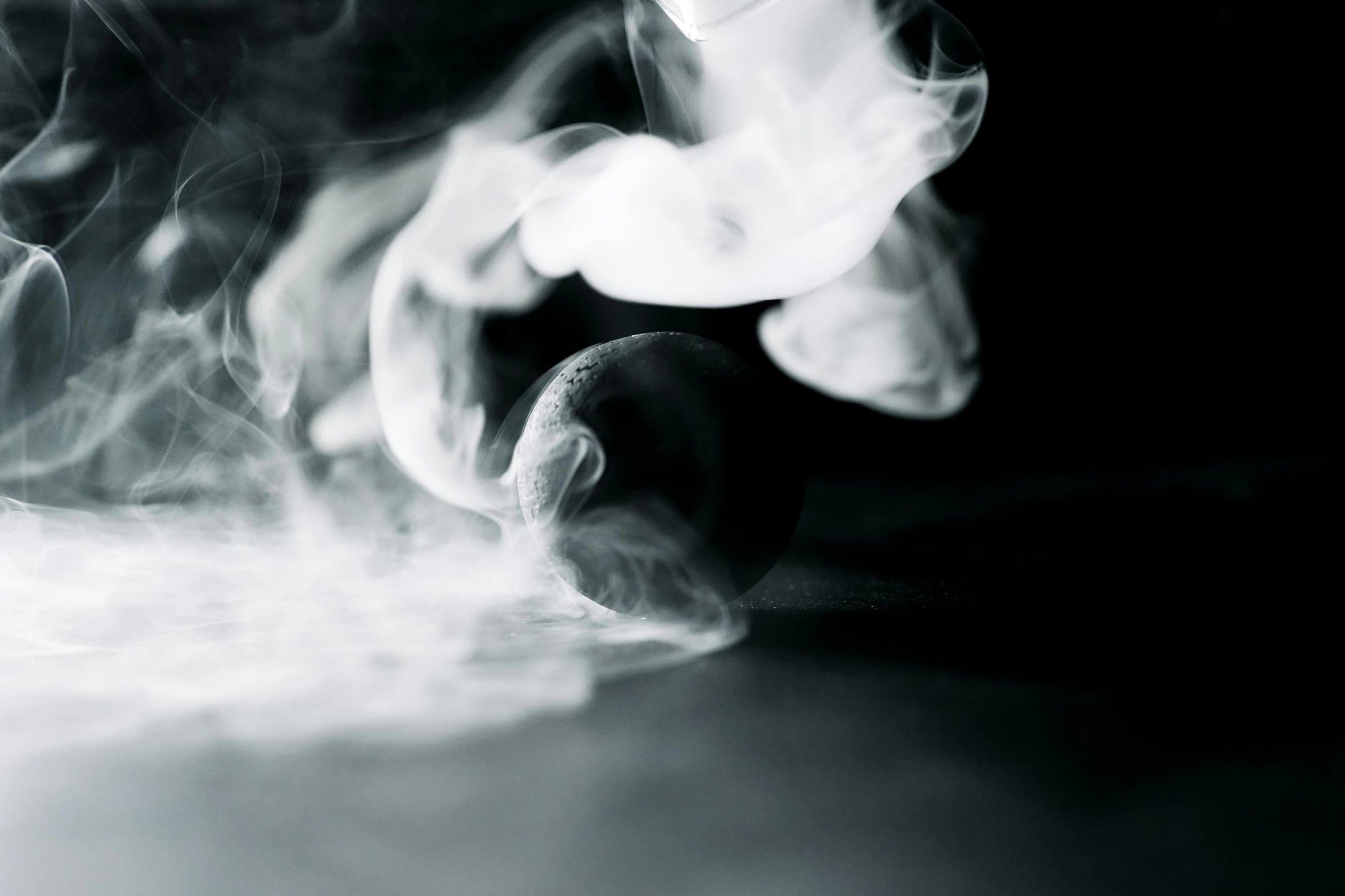 a black and white photo of smoke coming out of an apple, by Matthias Stom, unsplash, steamboat willy, mint, close - up photograph, diffused