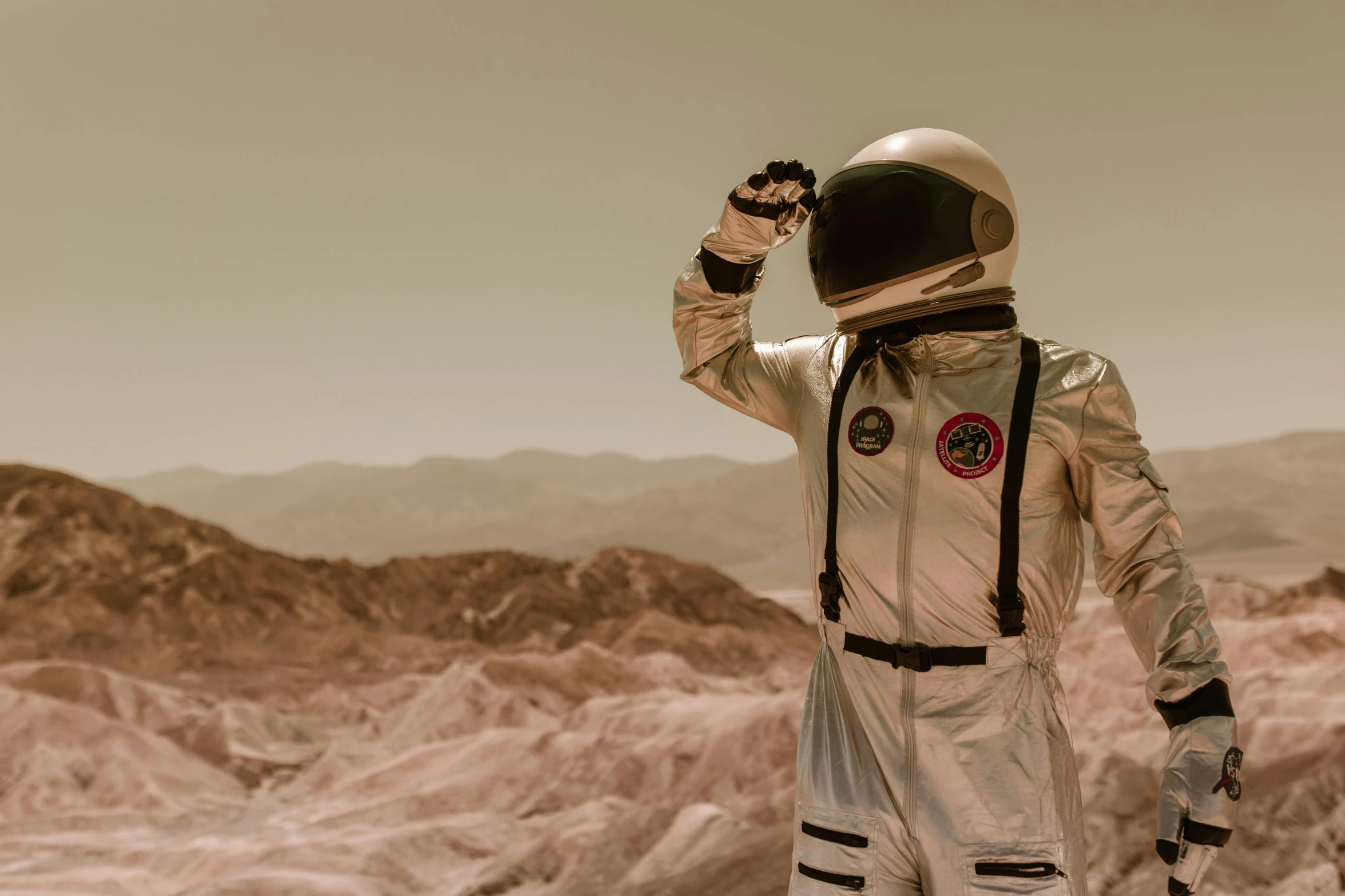 a close up of a person in a space suit, a colorized photo, pexels contest winner, sepia photography, martian landscape, full costume, instagram post