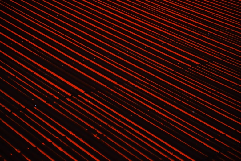 a red and black background with lines, a microscopic photo, by Andreas Gursky, unsplash, hd footage, refracted lines and sparkles, roofing tiles texture, ( ( glitch art pixel sorting ) )