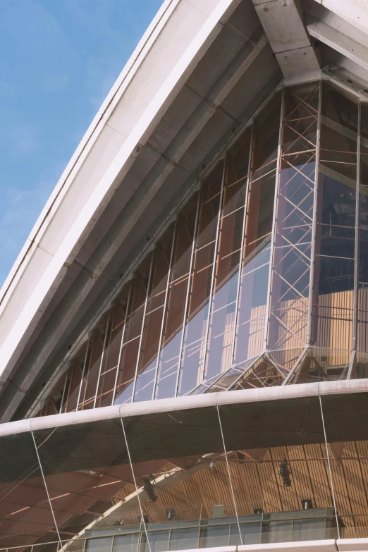 a very tall building with a lot of windows, sydney opera house, steel window mullions, 1996), awnings