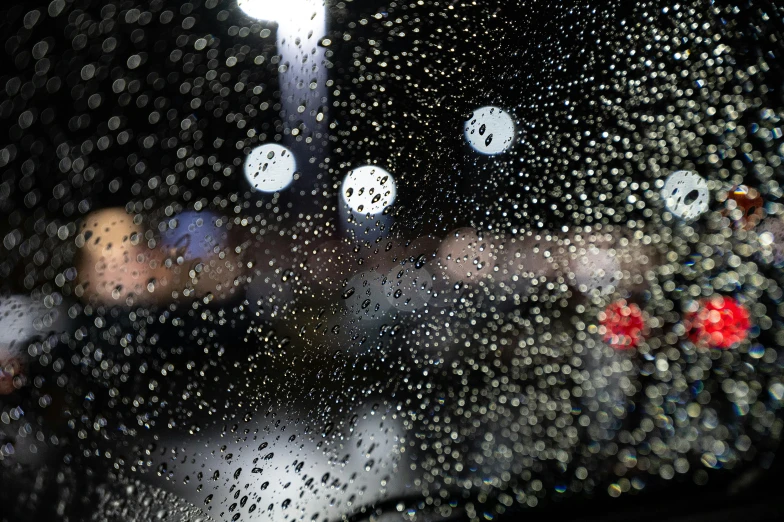 a close up of a car window with rain on it, by Adam Chmielowski, lights off, a hyper realistic, thumbnail, upset