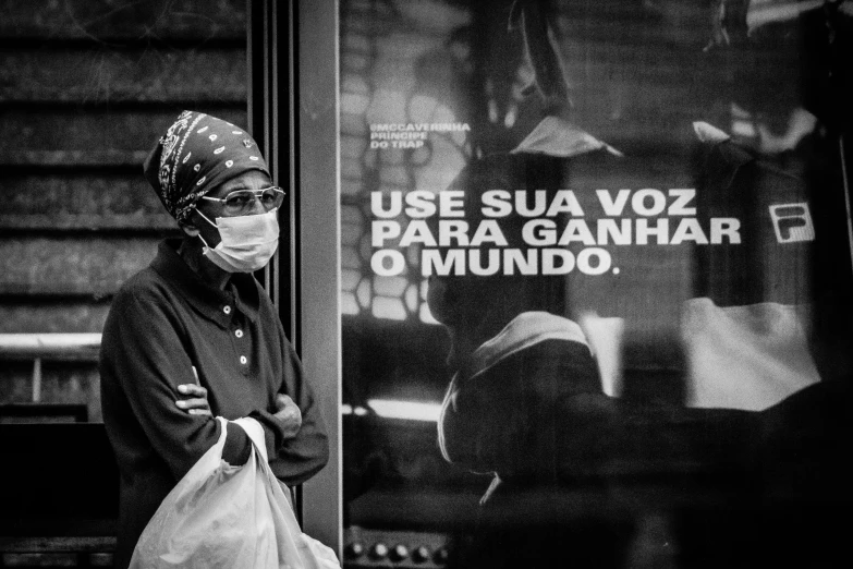 a black and white photo of a woman wearing a face mask, a poster, by Joze Ciuha, excessivism, são paulo, healthcare worker, modest, so come on