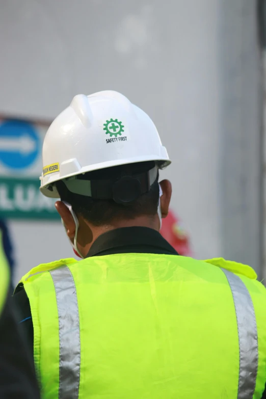 a group of construction workers standing next to each other, by Évariste Vital Luminais, shutterstock, wearing a laurel wreath, wearing green, sean mcloughlin, profile image